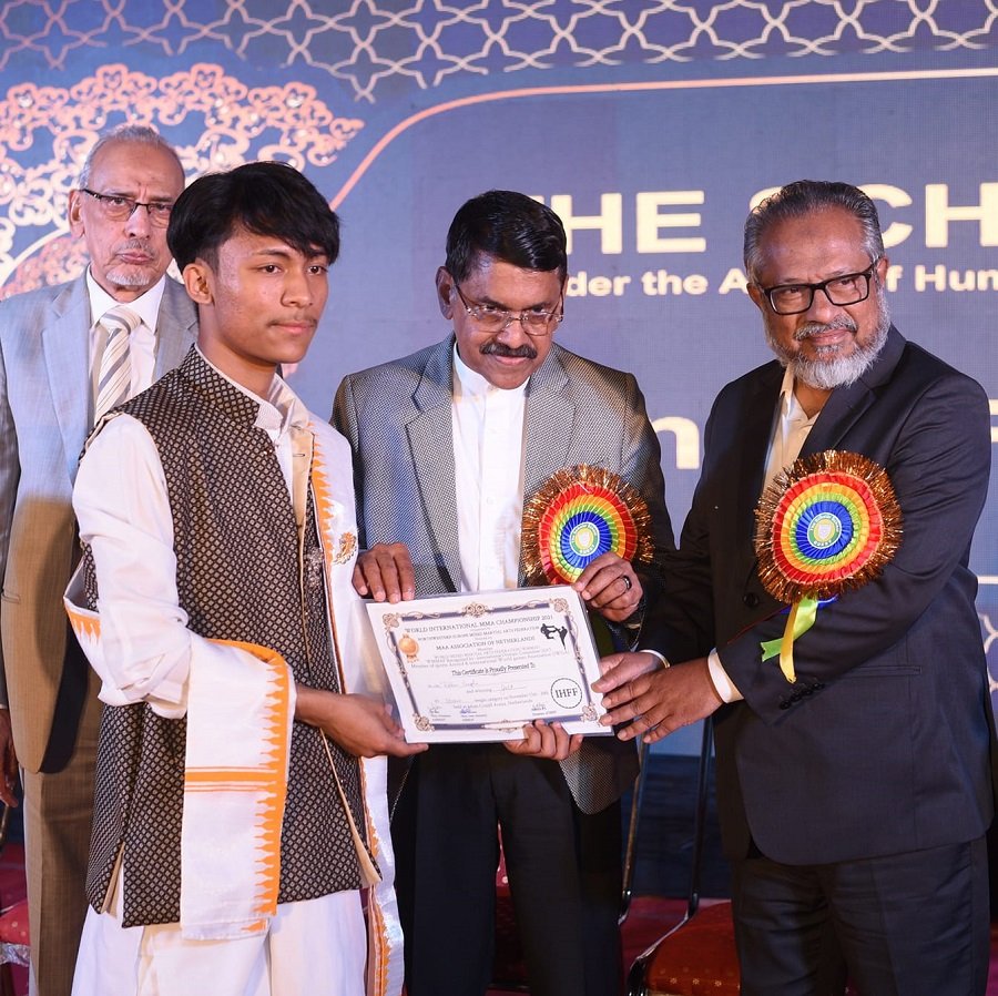 Rohan Sinha, Grade IX student at The Scholar School, Guwahati, has been felicitated by T Arifali, Vice Chairman, HWF for winning Gold Medal in Boxing Championship.